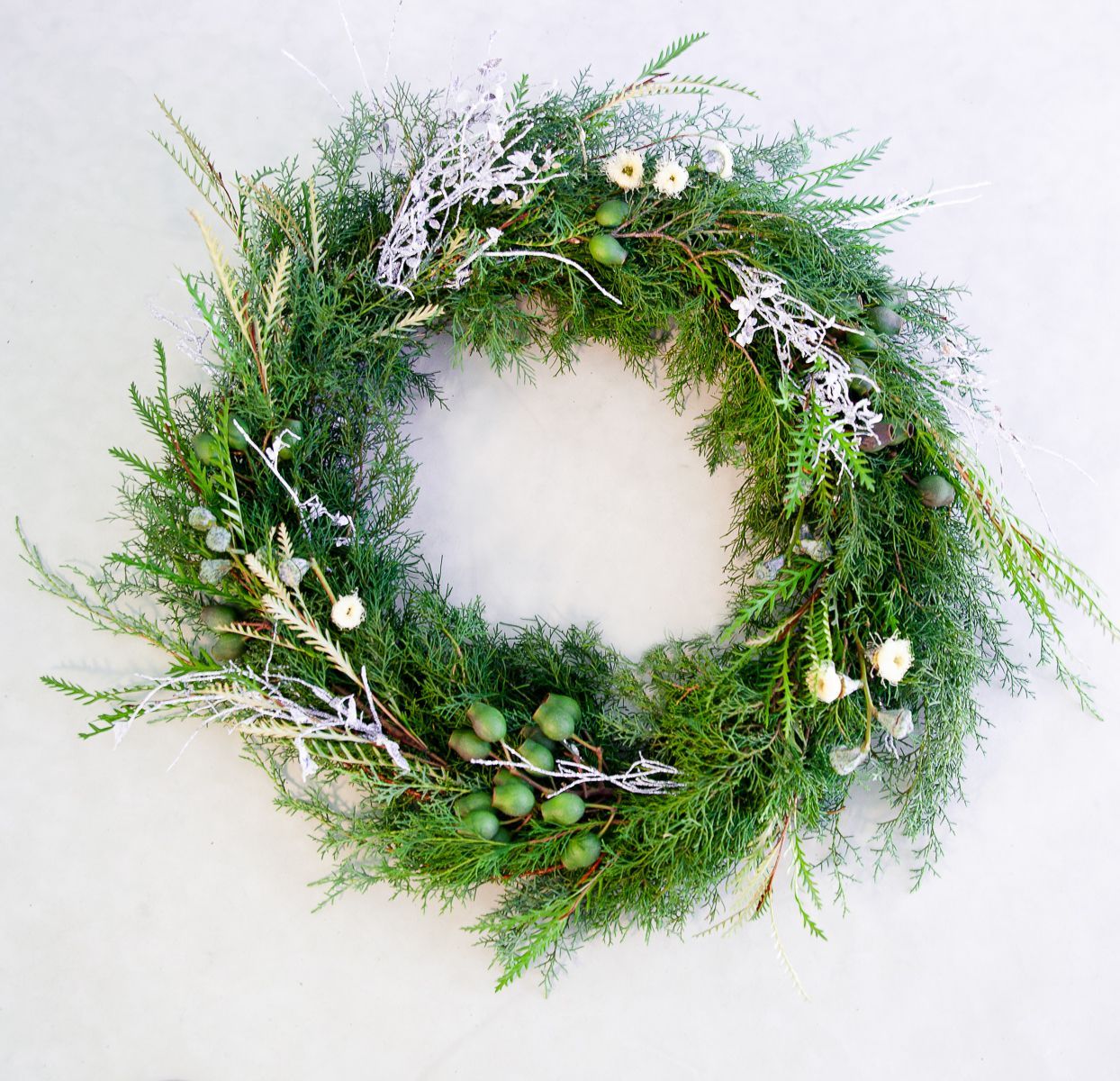 Cypress and Eucalyptus Pod Christmas Wreath. Flora and Flare. 