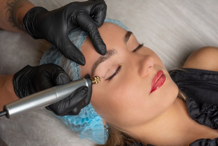 A Lady Getting Cosmetic Tattoo Make Up — Cosmetic Tattoos And Training Services In Gold Coast, QLD