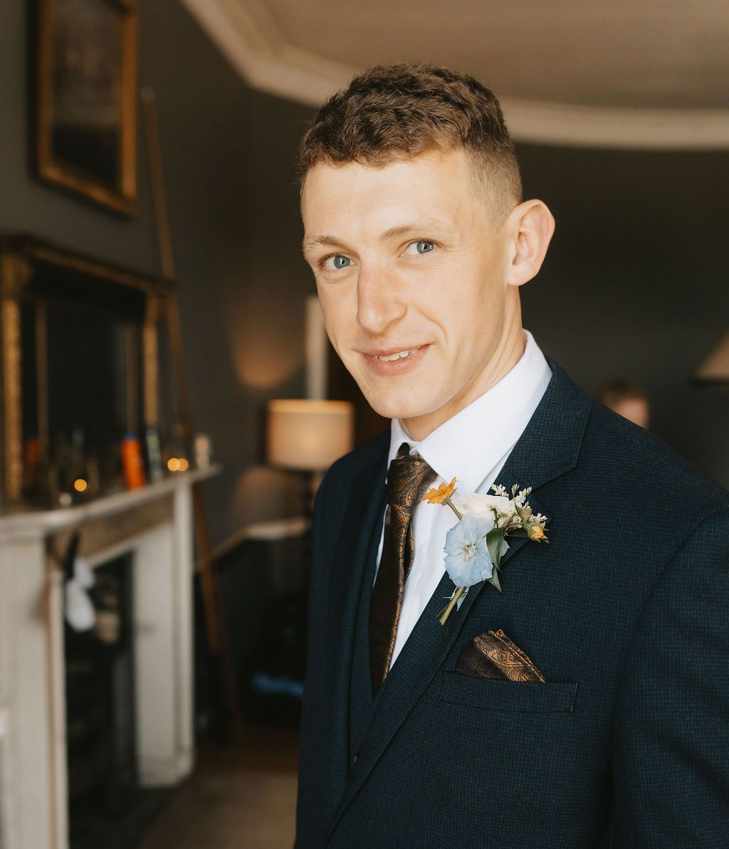 a bride and groom are dancing in front of a crowd at their wedding reception .