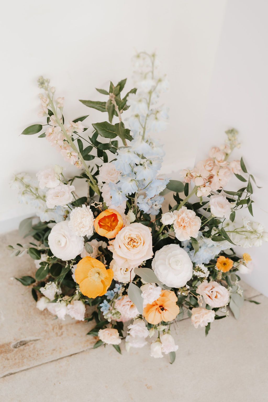 a bride and groom are walking down the aisle at their wedding .