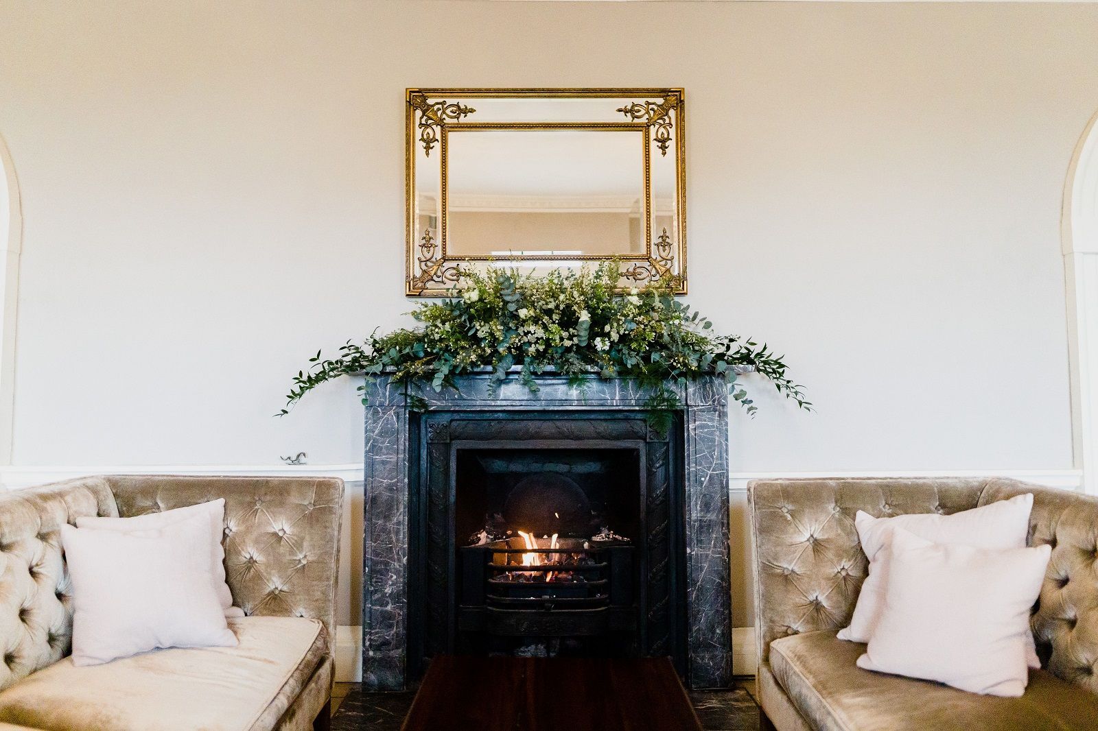 a living room with two couches and a fireplace .