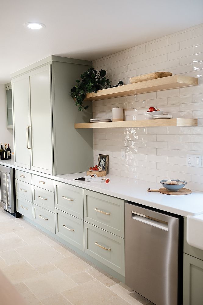 Full kitchen remodel in San Diego by Team Renovate . sage brush cabinets   open kitchen design