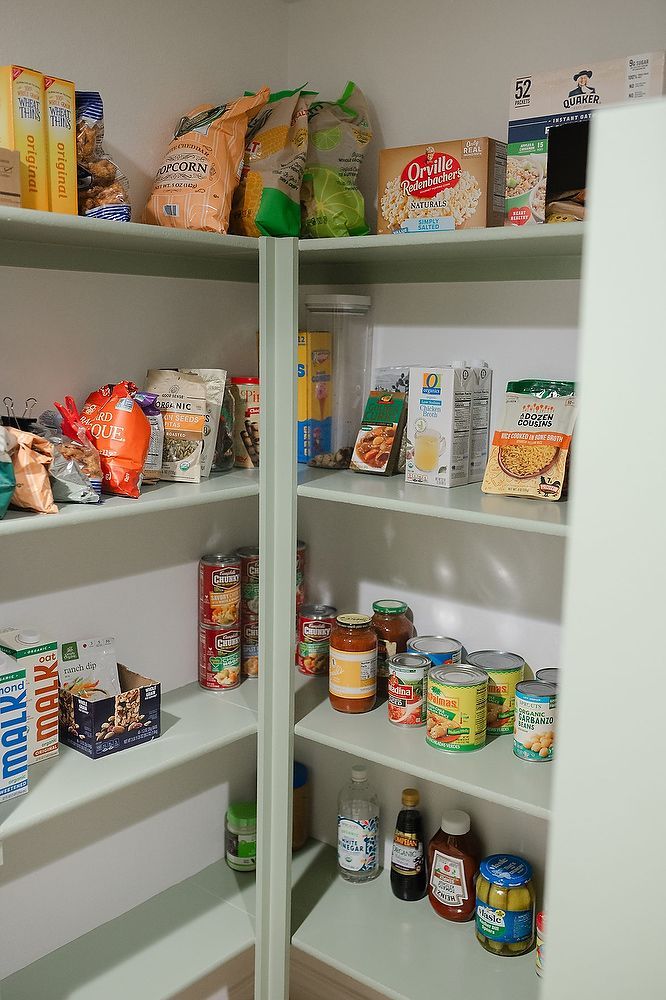 Full kitchen remodel in San Diego by Team Renovate . sage brush cabinets  kitchen pantry