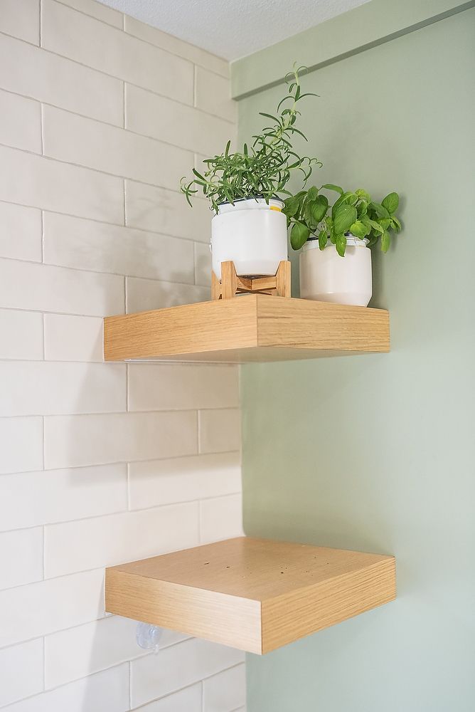 Full kitchen remodel in SanDiego by Team Renovate . sage brush cabinets   floating shelves