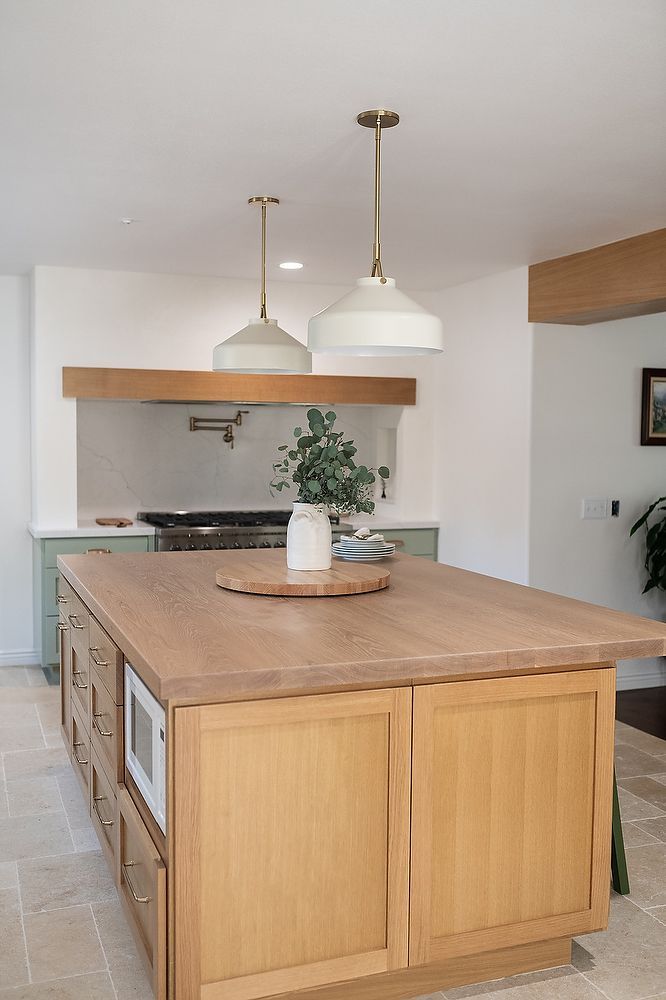 Full kitchen remodel in San Diego by Team Renovate . sage brush cabinets   kitchen island