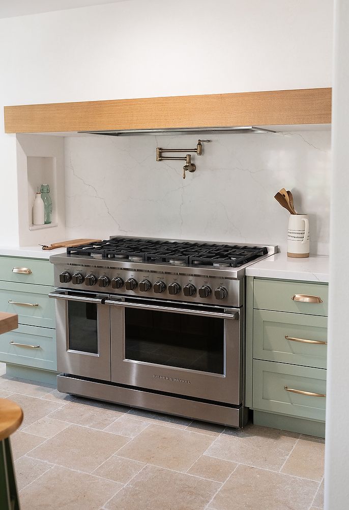 Full kitchen remodel in San Diego by Team Renovate . sage brush cabinets  -full range