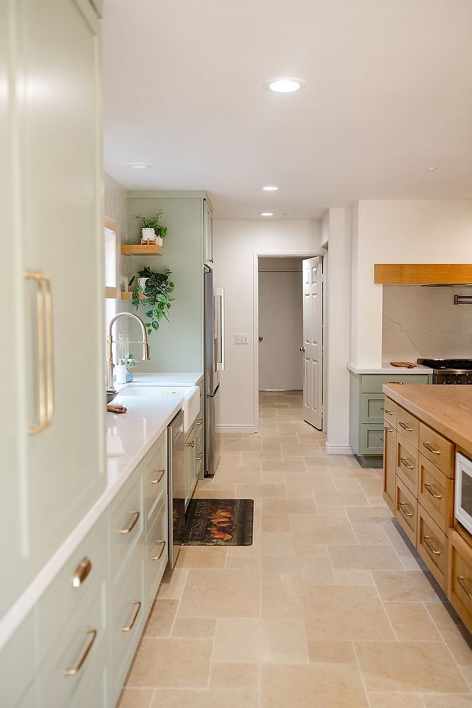Full kitchen remodel in San Diego by Team Renovate . sage brush cabinets   open kitchen design