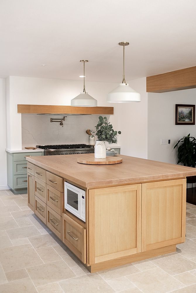 Full kitchen remodel in San Diego by Team Renovate . sage brush cabinets   open kitchen design