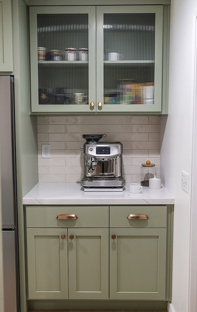 Full kitchen remodel in San Diego by Team Renovate . sage brush cabinets   open kitchen design