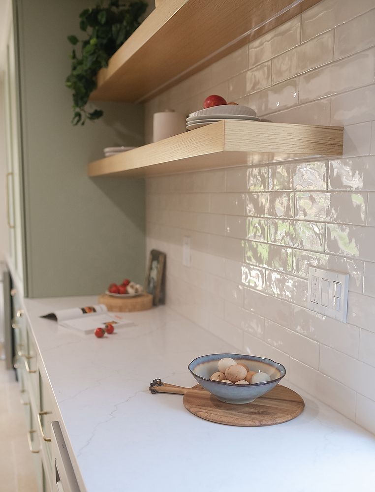 Full kitchen remodel in San  Diego by Team Renovate . sage brush cabinets   open kitchen design - floating shelves