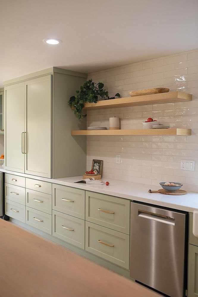Full kitchen remodel in San Diego by Team Renovate . sage brush cabinets   open kitchen design