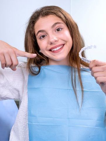 teen with invisalign