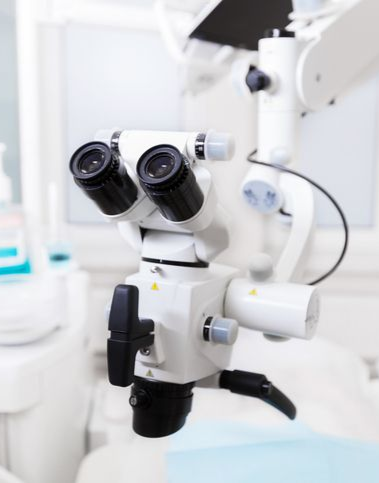 A woman is sitting in a dental chair with a toothache.