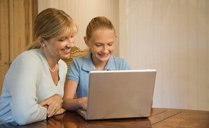 mom and daughter doing homework