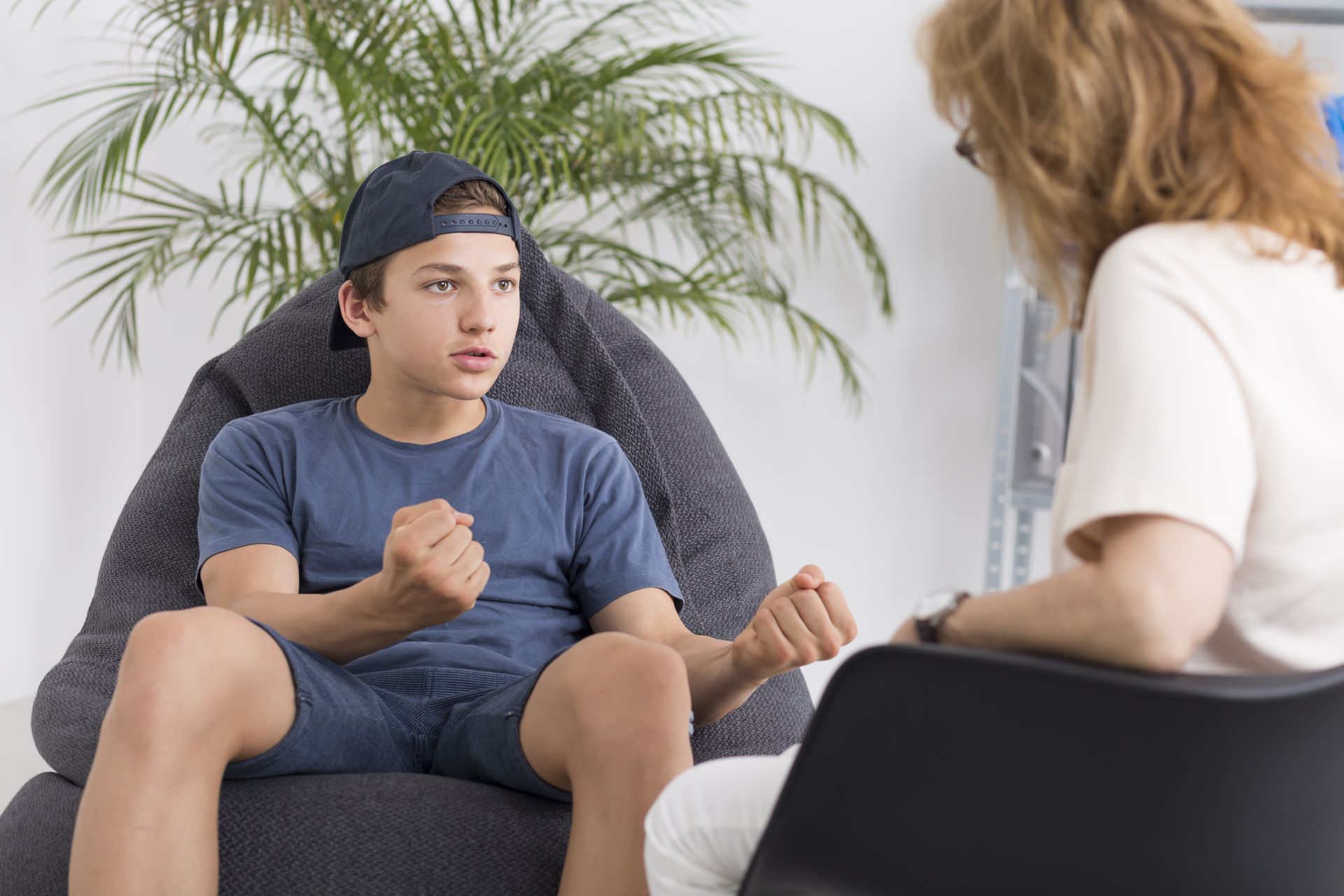 A teenage boy having an anger therapy