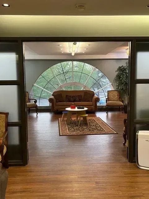 Spacious therapy room at BBHC Facility equipped with comfortable furniture and calming decor