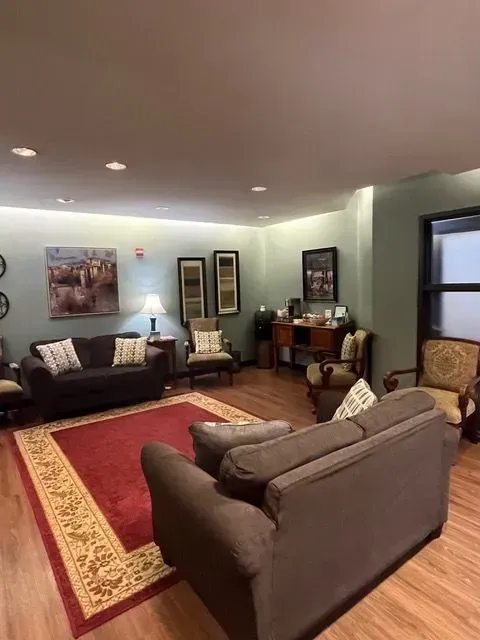 Bright and welcoming entrance area of the BBHC Facility with comfortable seating