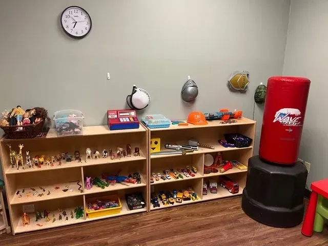 BBHC Facility's modern playroom with various toys and activities for children.