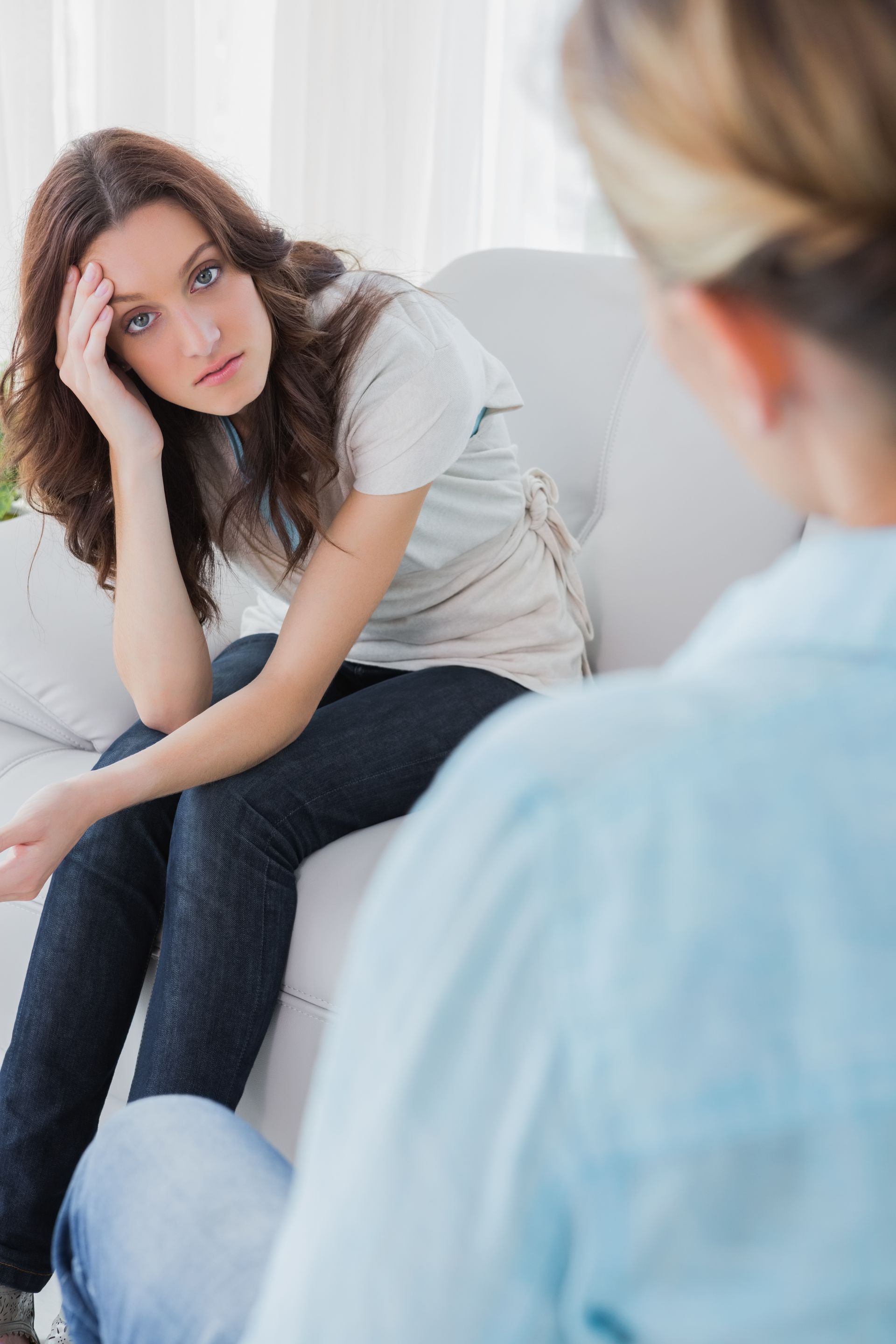Young adult woman having a counseling