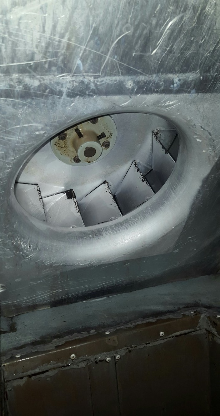 a close up of a fan with a hole in the middle of it .