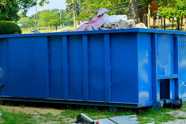 Blue Metal Waste Container — Litchfield, MN — L & R Roll Off & Cleanup LLC