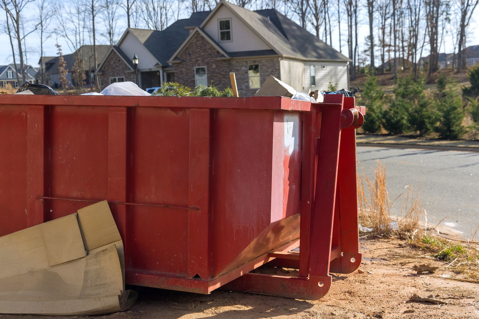 Recycling household waste into construction debris, showcasing dumpster rental for easy cleanup.