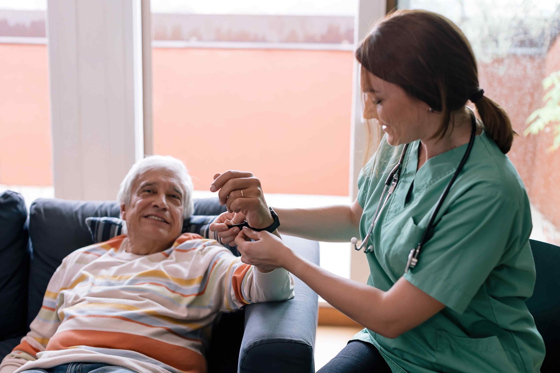 Nurse assisting an elderly patient