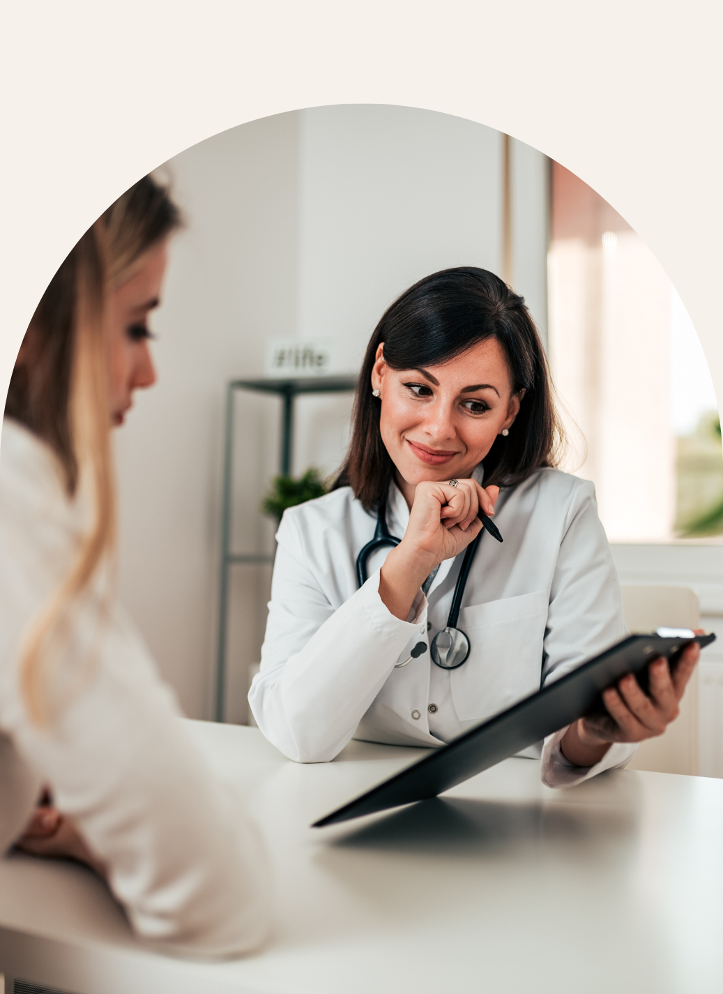 The doctor is showing files to her patient