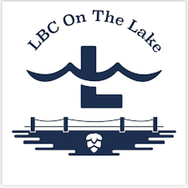 A logo for lbc on the lake with a cross in the water.