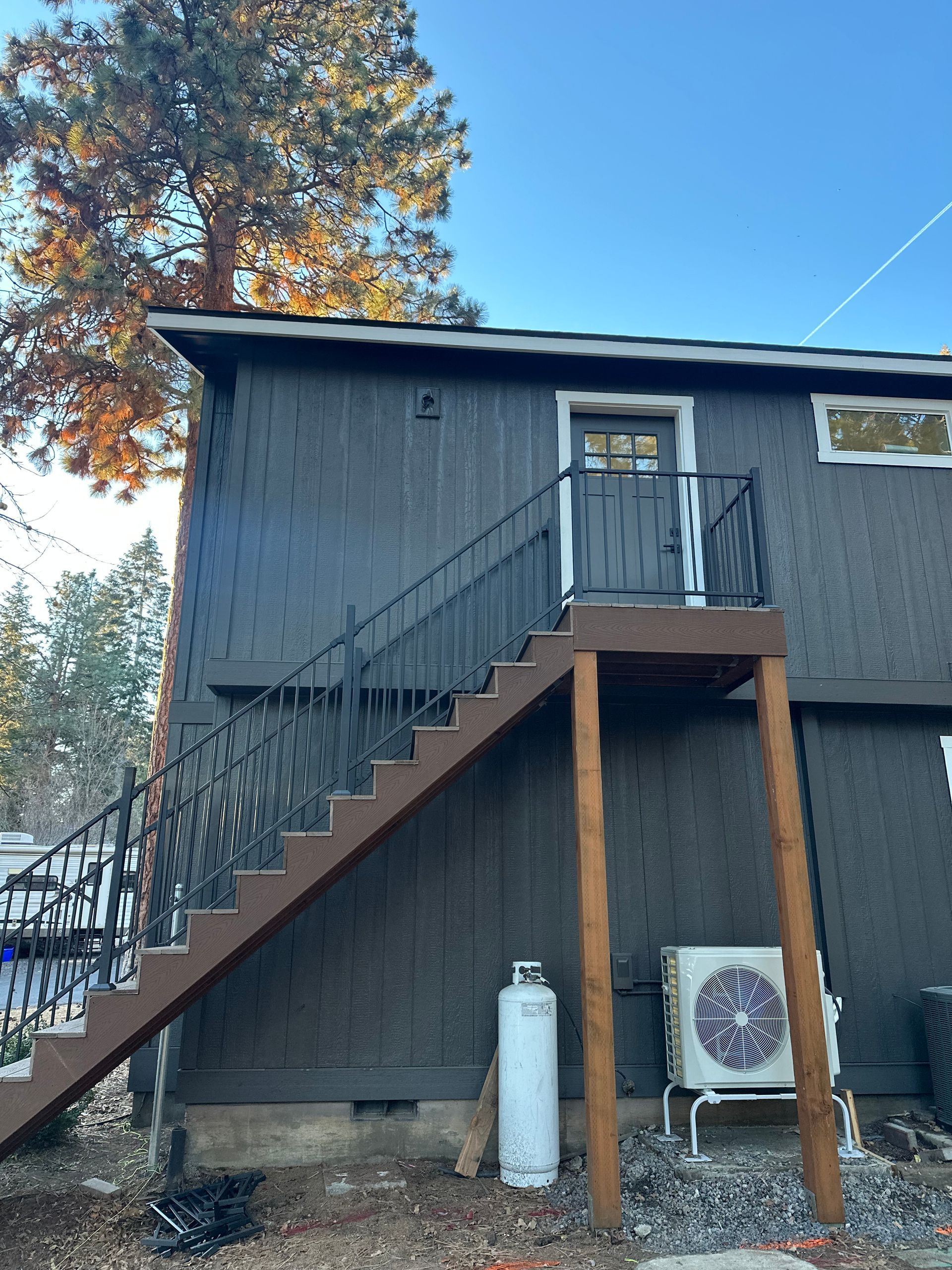 A house with stairs leading up to the second floor