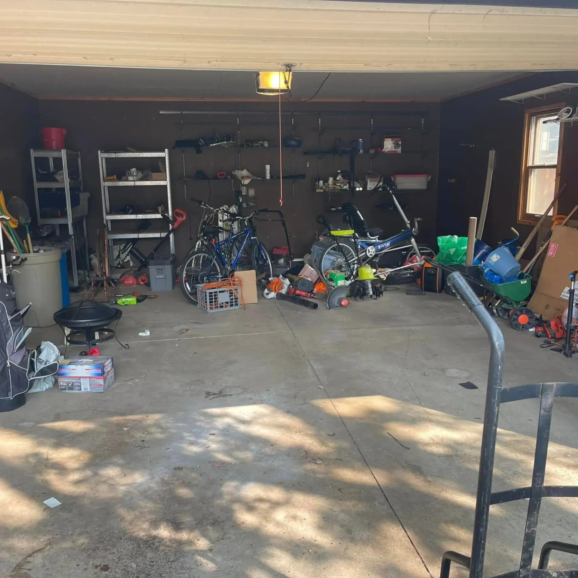 Hall's Hauling -A garage filled with lots of tools and bikes