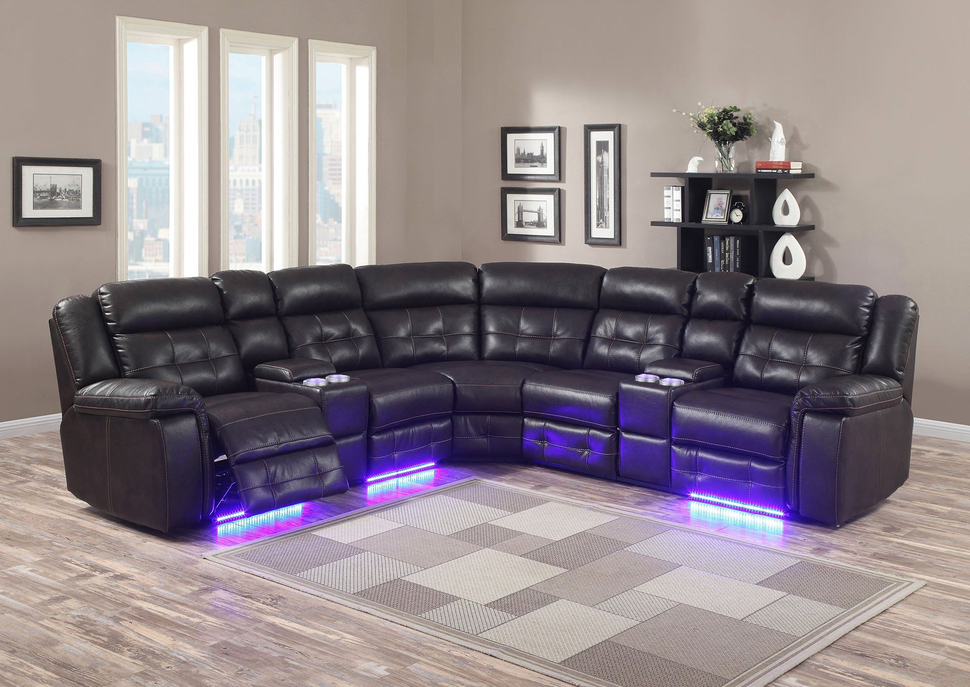 Black leather couch provided by us in Schenectady, NY