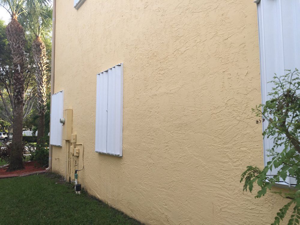 An aerial view of a large wave in the ocean.