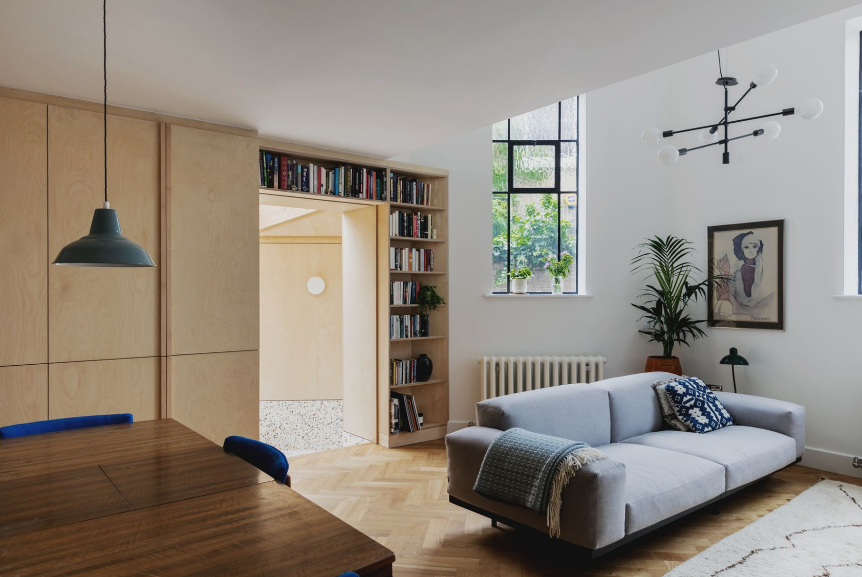 A living room with a couch and a table