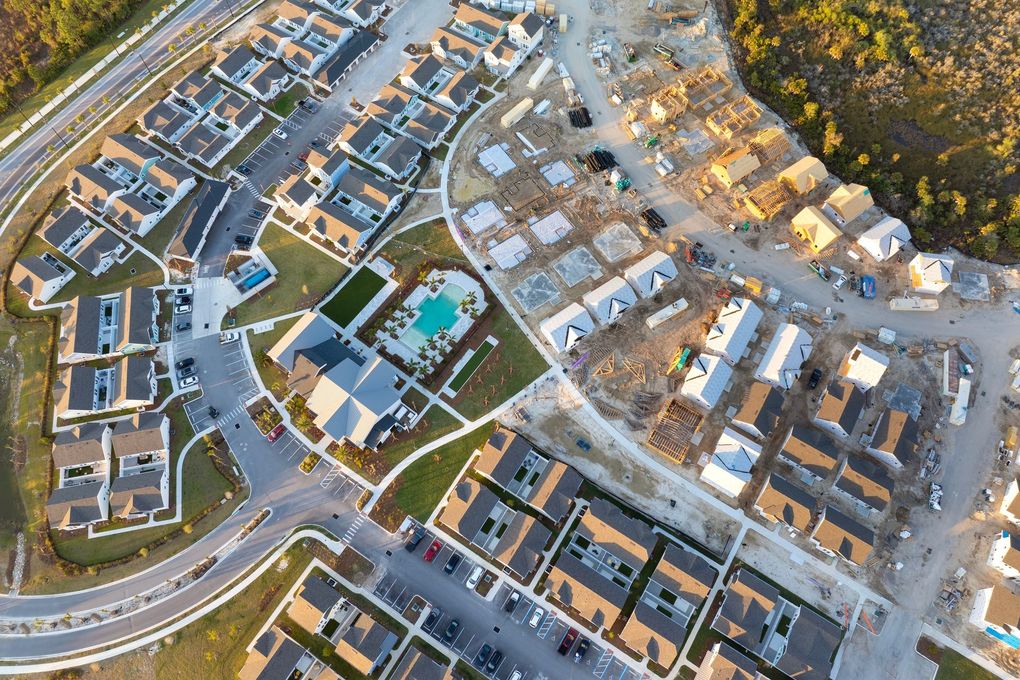 An aerial view of a residential neighborhood under construction.