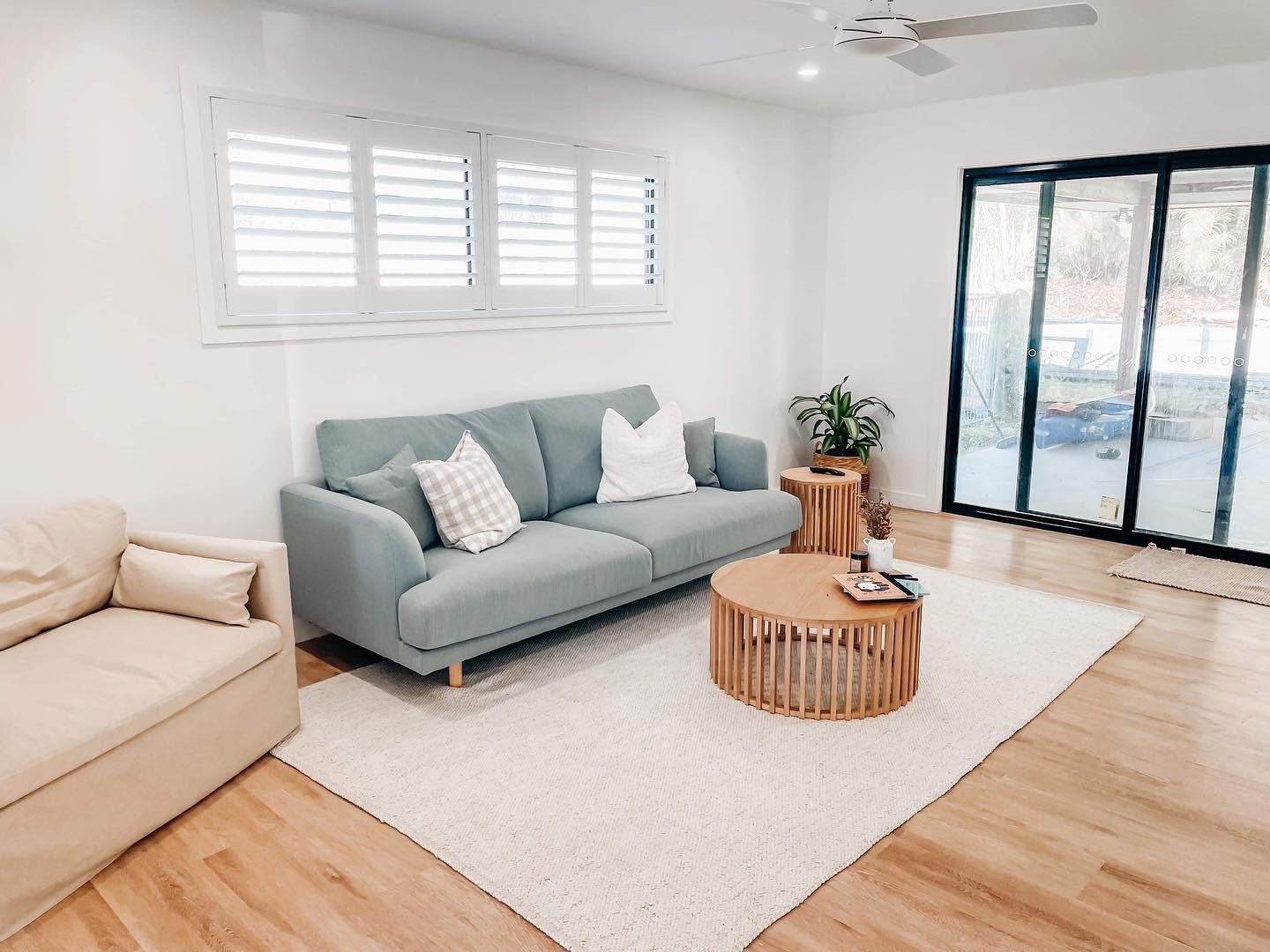 There is a couch and a coffee table in the living room.