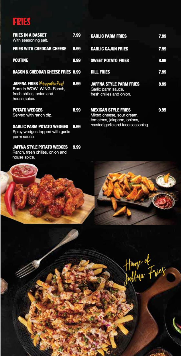 Dark restaurant menu with fried chicken dishes and plated skewers on a black background