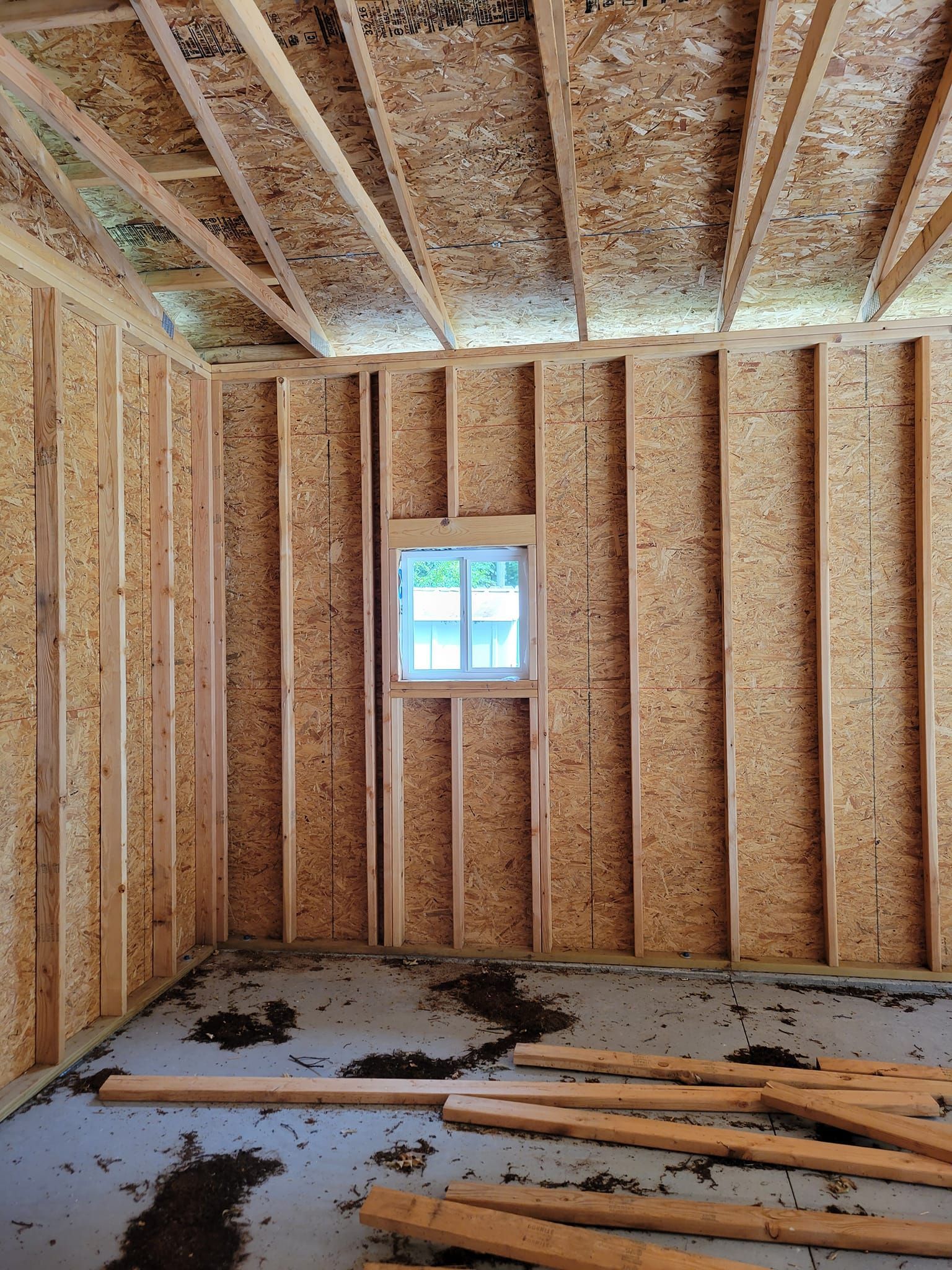 There is a window in the middle of the room.