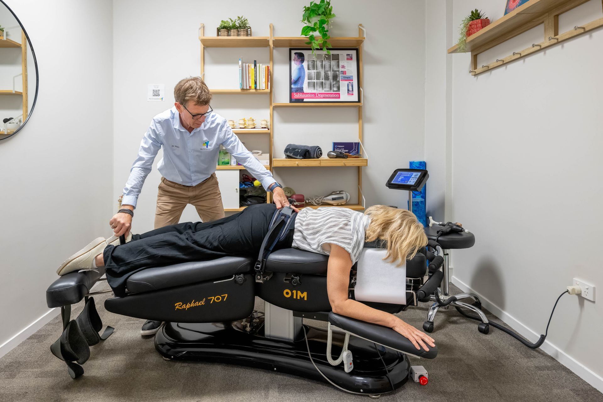 Person Receiving Back Adjustment from A Healthcare Provider — My Chiropractor Mackay City in Airlie Beach, QLD