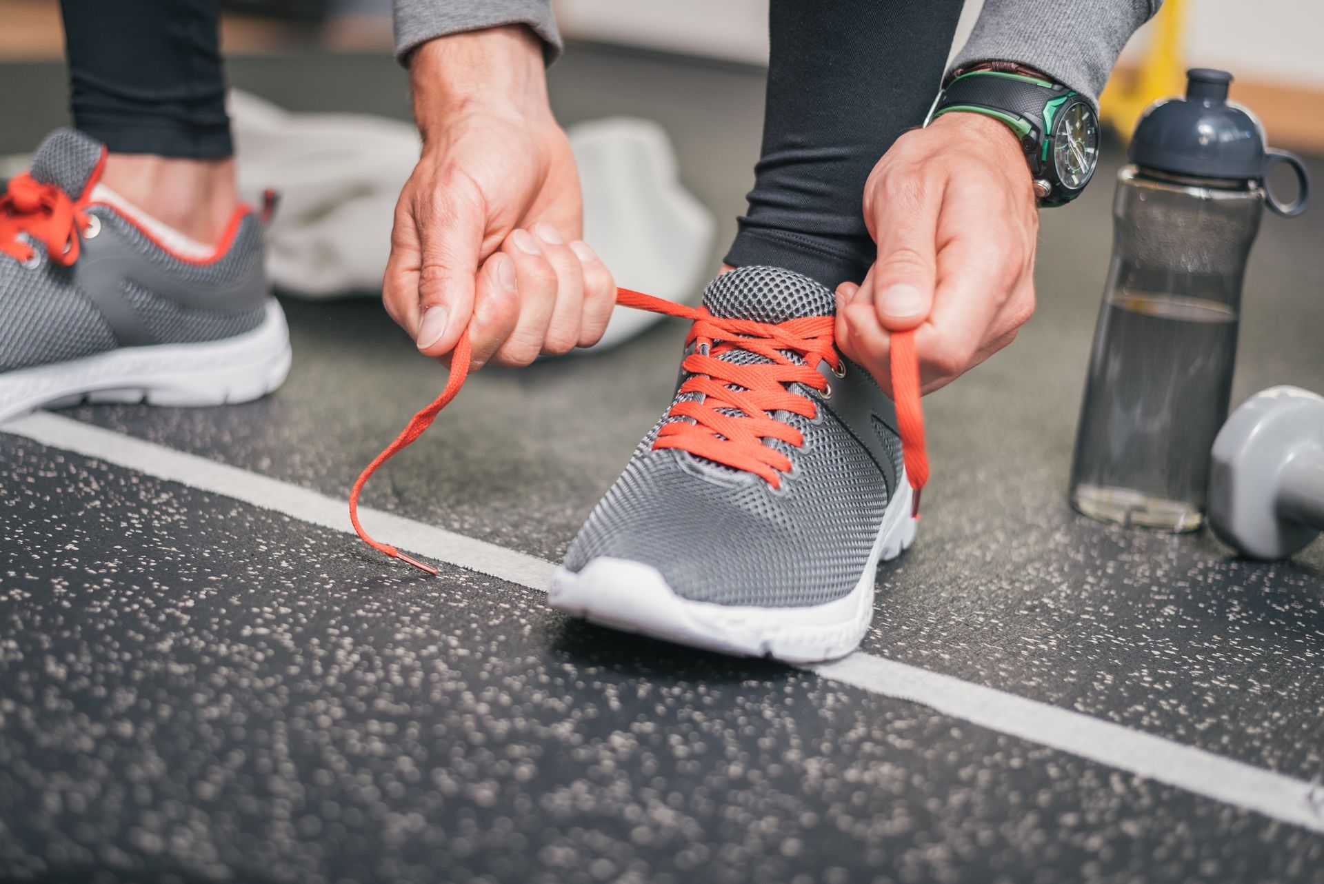 A Beige Flip-flop Sandal With A Textured Strap, Sitting On A White Surface — My Chiropractor Mackay City in Mackay, QLD