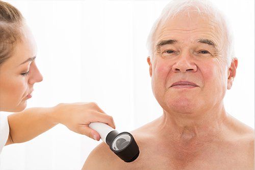 Hair Loss — Old Man Getting Skin Test in Nashville, TN