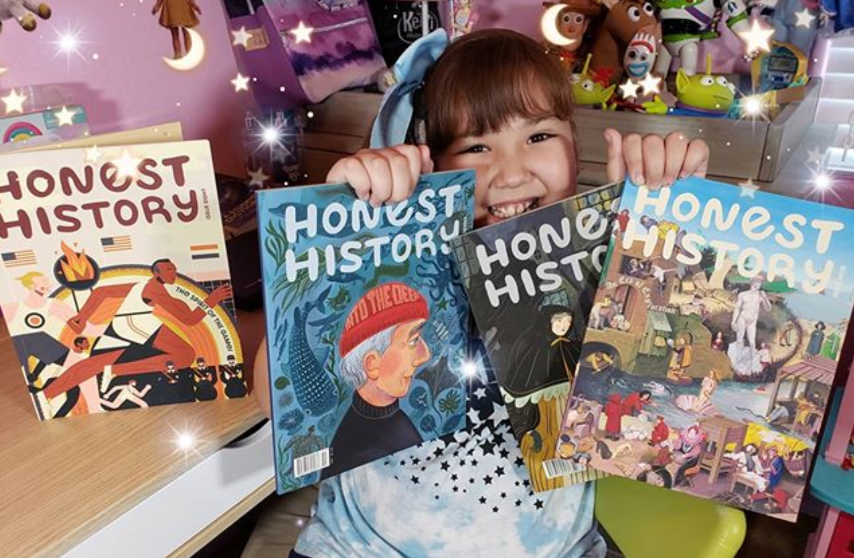 A little girl is holding two books titled honest history. Eden Creative Arts - Private Christian Micro School