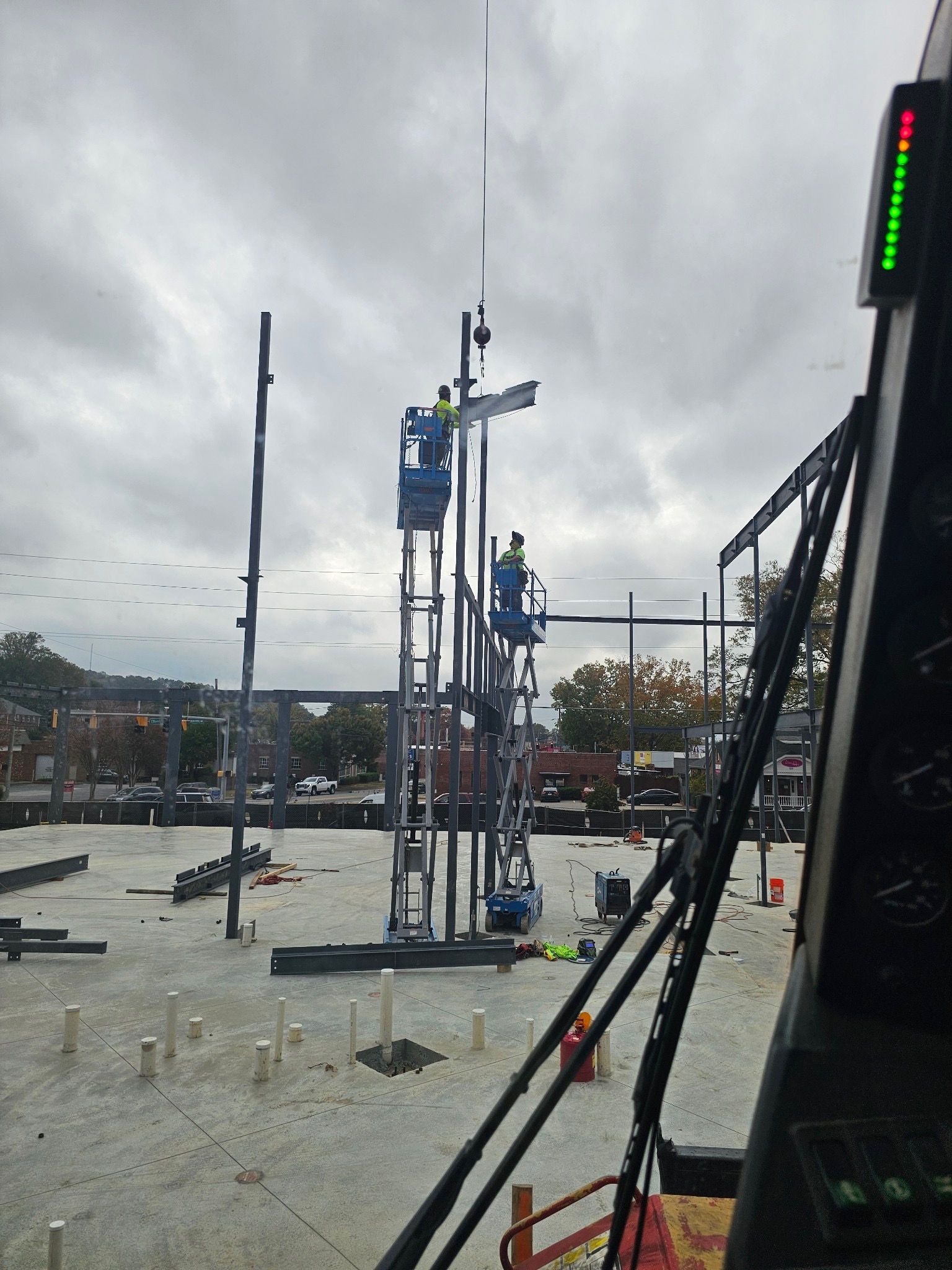 A view of a construction site from inside a crane.