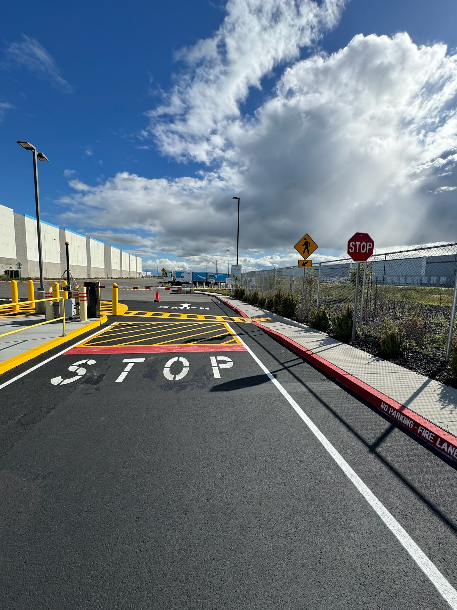 A stop sign is painted on the side of a road.