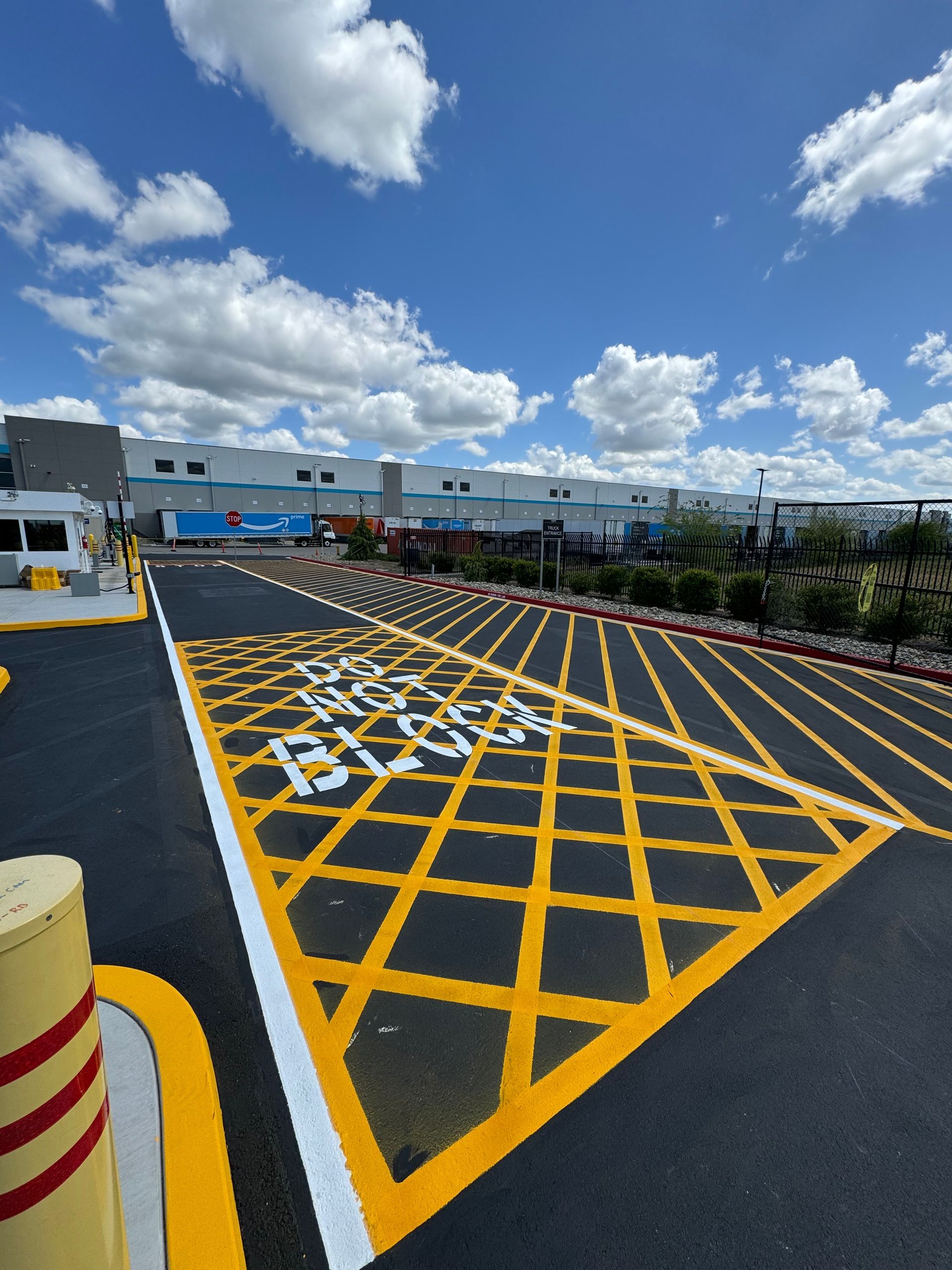 A parking lot with a sign that says