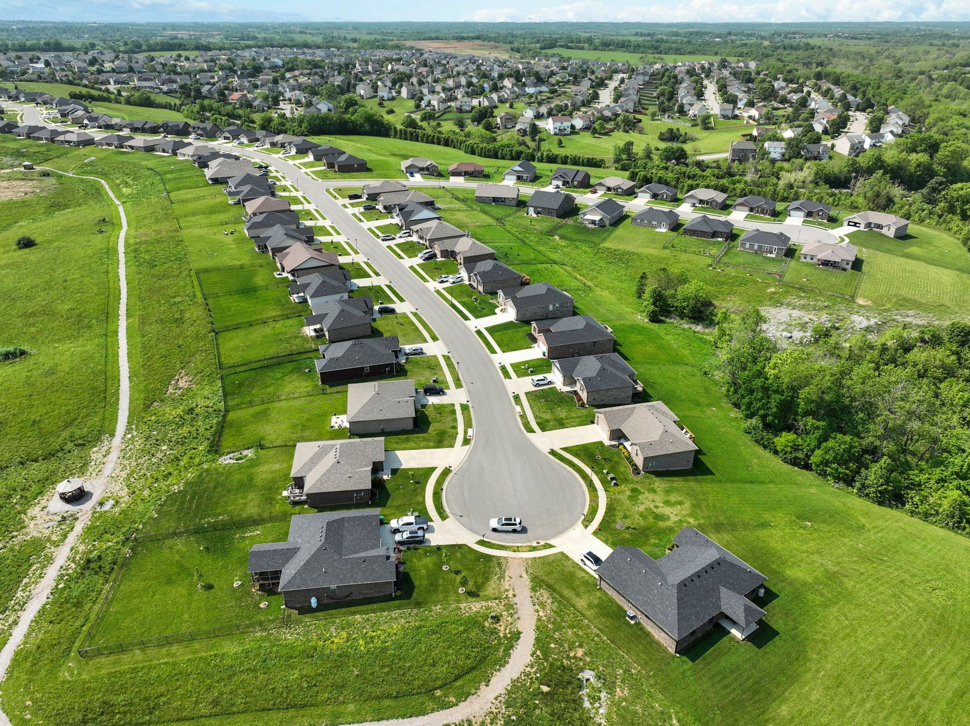 An aerial view of a residential area with lots of houses