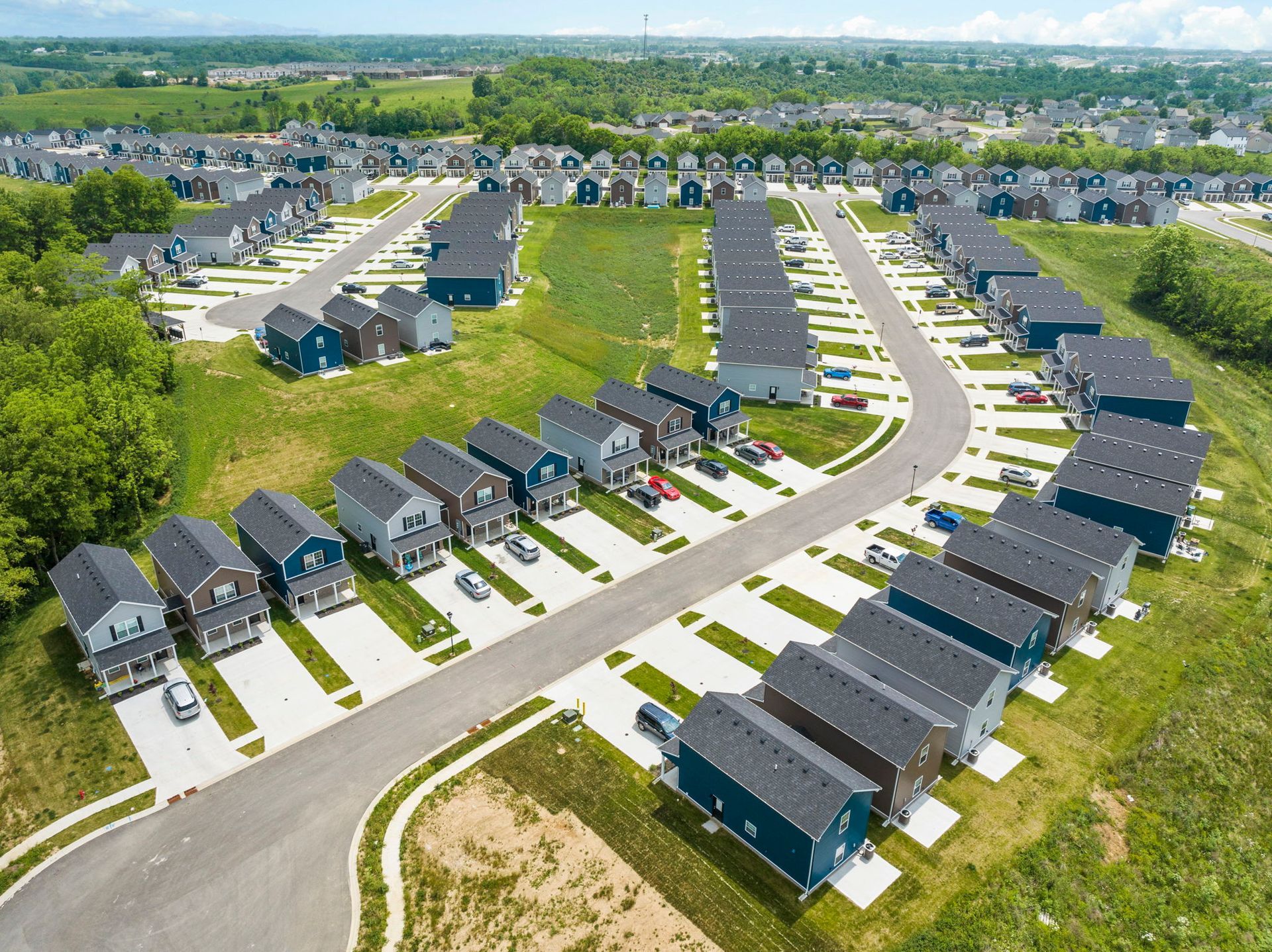 An aerial view of a row of houses in a residential area.