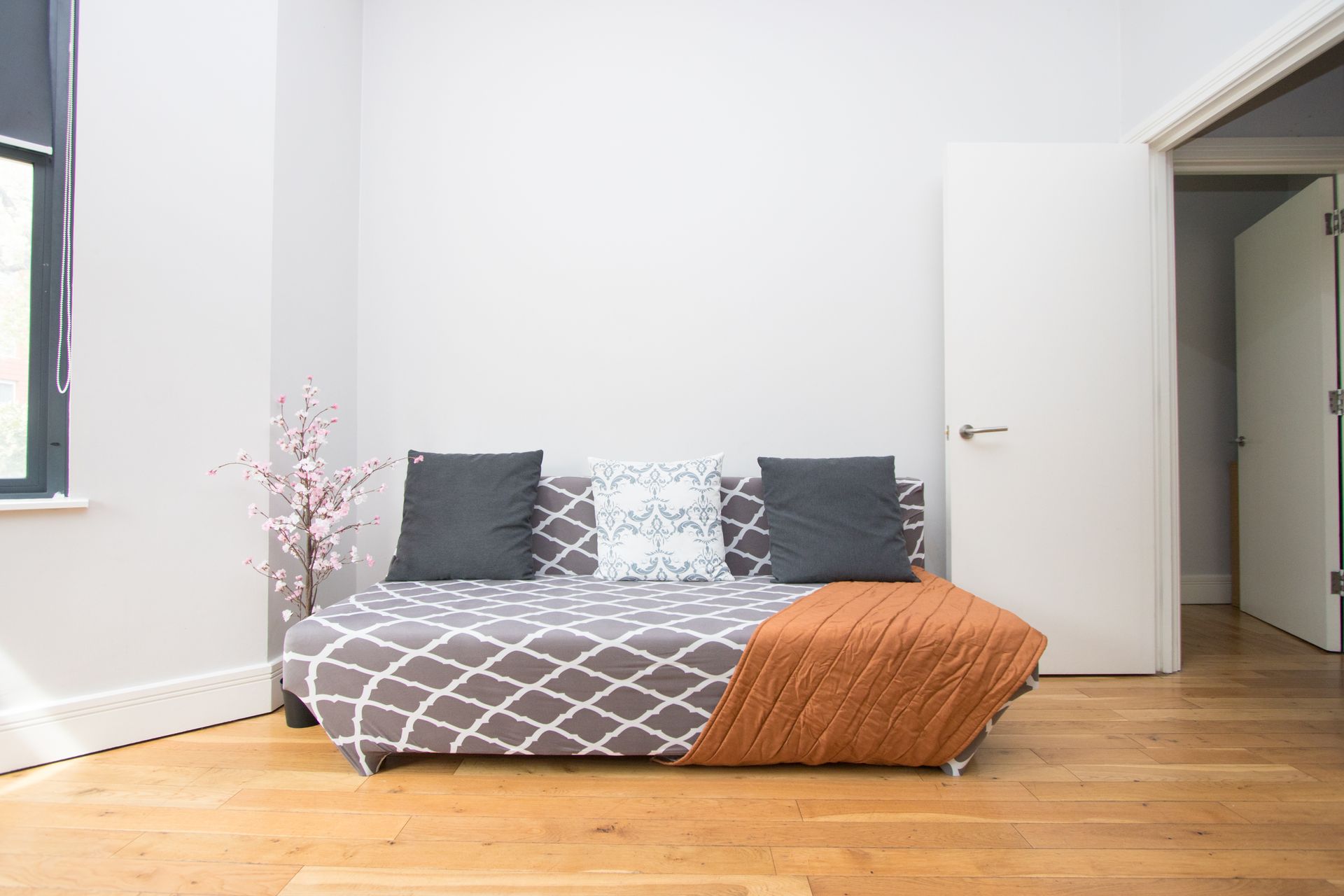 There is a couch in the middle of the room.