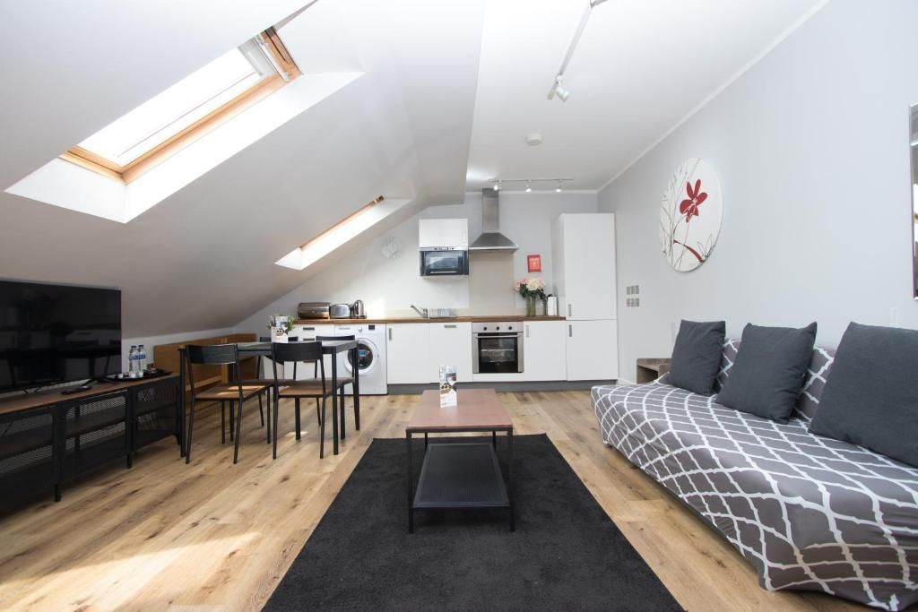 A living room with a couch and a table