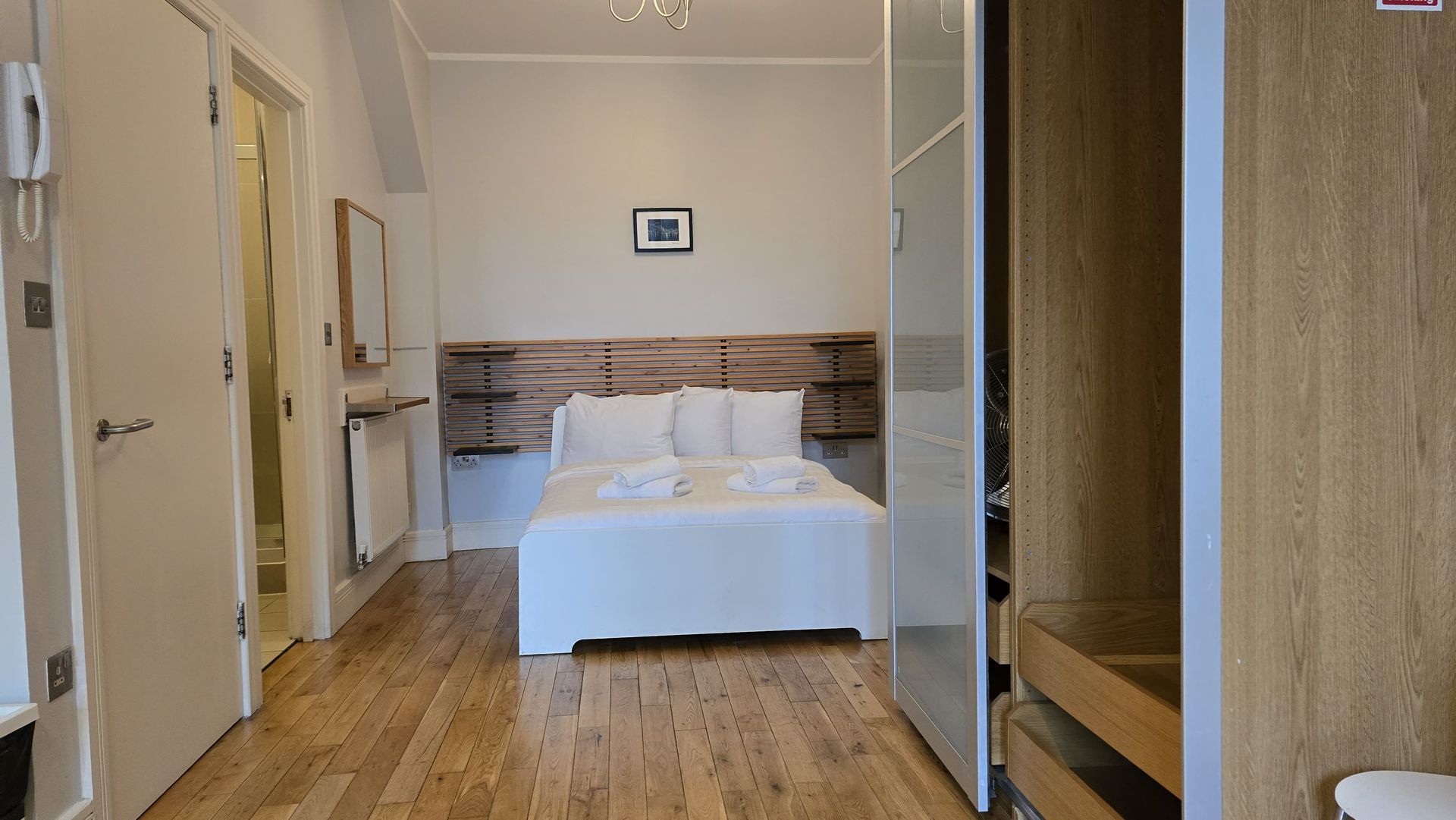 There is a bed in the middle of the room.